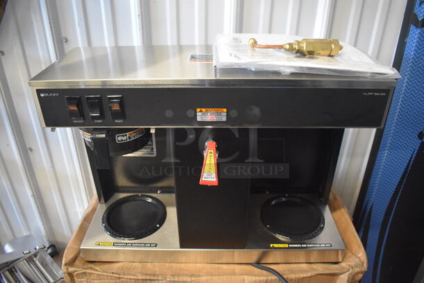 LIKE NEW! 2022 Bunn VLPF Stainless Steel Commercial Automatic Coffee Brewer with Two Lower Warmers and Poly Brew Basket. Used a Few Times at Trade Show as a Demonstration. 120 Volts, 1 Phase. 23.5x8x17. Tested and Working!