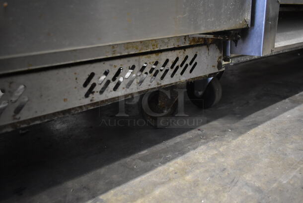 Stainless Steel Commercial 2 Door Work Top Cooler w/ Back Splash on Commercial Casters. Tested and Working! - Image 4 of 6