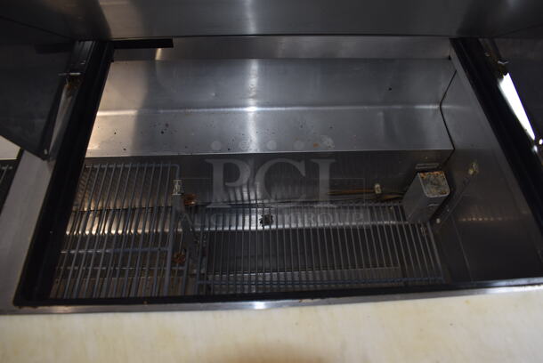 2015 Model True TSSU-72-30M-B-ST Commercial Stainless Steel Sandwich/Salad Prep Table With Overhead Shelving And Refrigerated Base With Steel Racks. 115V/1 Phase. Tested And Working! - Image 5 of 9