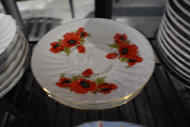 4 White Ceramic Saucers w/ Red Floral Pattern. 6.5x6.5x1. 4 Times Your Bid!