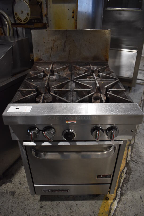 Southbend S24E Stainless Steel Commercial Natural Gas Powered 4 Burner Range w/ Oven on Commercial Casters. 24.5x34x48
