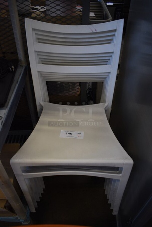 6 White Poly Stackable Chairs. 18x19x33.5. 6 Times Your Bid! - Image 1 of 3
