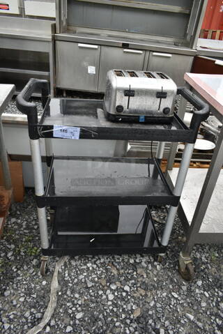 Black Poly 3 Tier Cart w/ Push Handles on Commercial Casters. Does Not Come w/ Toaster.