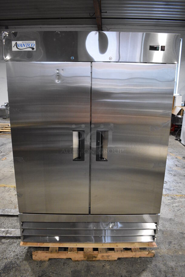 BRAND NEW SCRATCH AND DENT! Avantco 178A49FHC Stainless Steel Commercial 2 Door Reach In Freezer w/ Poly Coated Racks on Commercial Casters. 115 Volts, 1 Phase. 54x32x82. Tested and Working!