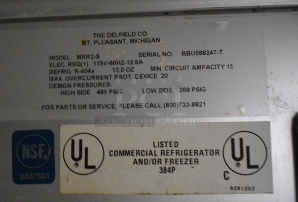 Delfield Model MRR2-S Stainless Steel Commercial 2 Door Reach In Cooler w/ Poly Coated Racks on Commercial Casters. 115 Volts, 1 Phase. 56x34x79. Tested and Powers On But Temps at 51 Degrees - Image 6 of 6