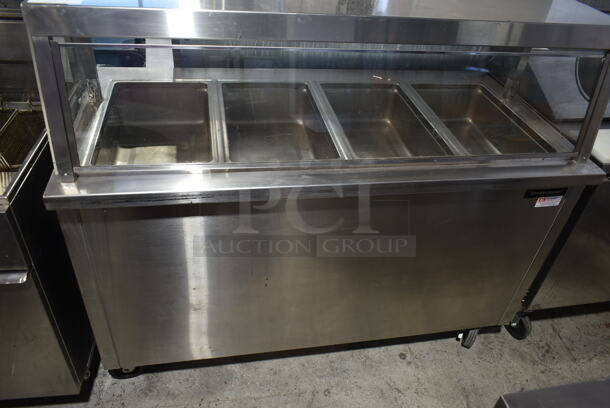 Delfield SH4-NU Stainless Steel Commercial Electric Powered 4 Bay Steam Table w/ Sneeze Guard on Commercial Casters. 120/208-240 Volts, 1 Phase.  - Image 2 of 10