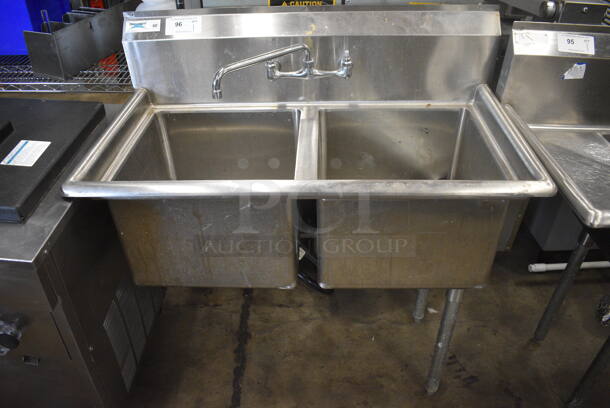 Stainless Steel 2 Bay Sink w/ Faucet and Handles. 2 Legs Need To Be Reattached. 41x22x45. Bays 17x17x12