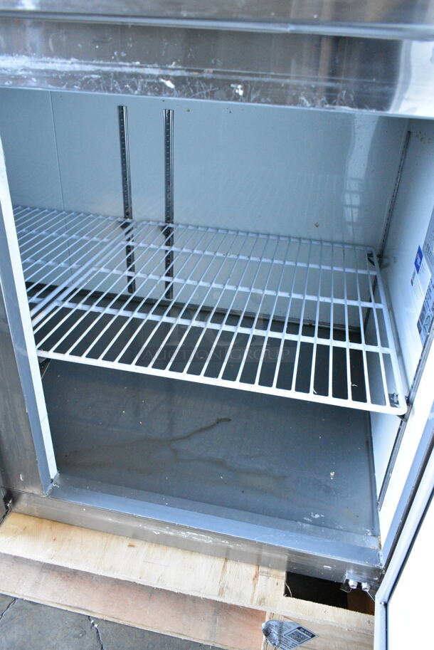 BRAND NEW SCRATCH AND DENT! 2024 Avantco 178APPT91HC Stainless Steel Commercial 3 Door Refrigerated Pizza Prep Table. 115 Volts, 1 Phase. Tested and Working! - Image 3 of 9