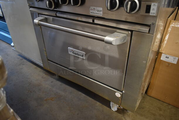 2016 Garland G36-6C Stainless Steel Commercial Natural Gas Powered 4 Burner Range w/ Left Side Flat Top and Convection Oven. - Image 4 of 7