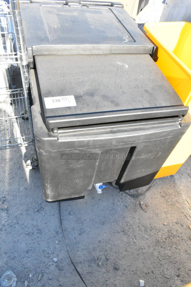 BRAND NEW SCRATCH AND DENT! Black Poly Portable Ice Bin on Commercial Casters.  - Image 1 of 2