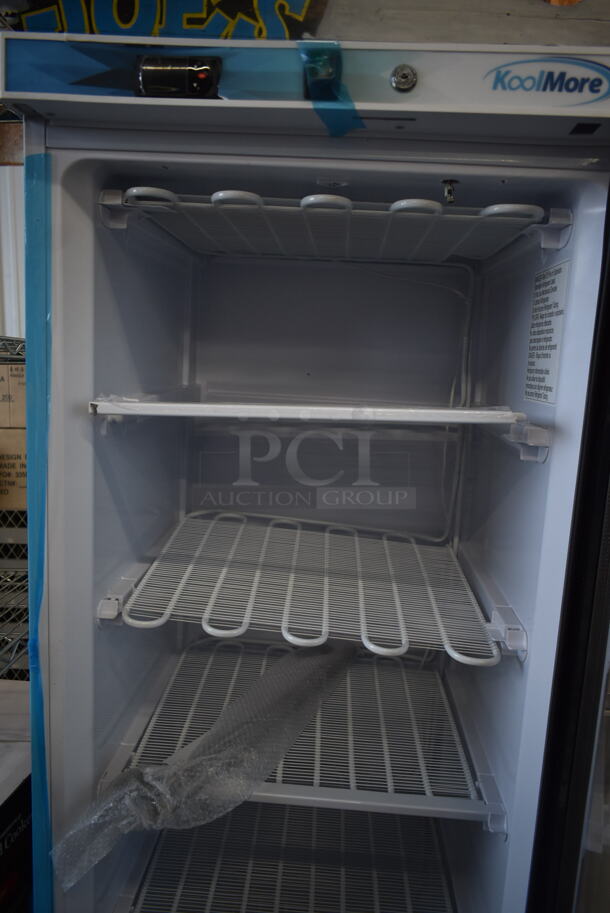 BRAND NEW SCRATCH AND DENT! KoolMore KM-FMD12WGD Metal Commercial Single Door Reach In Freezer Merchandiser w/ Poly Coated Racks. 115 Volts, 1 Phase. Tested and Working! - Image 6 of 7