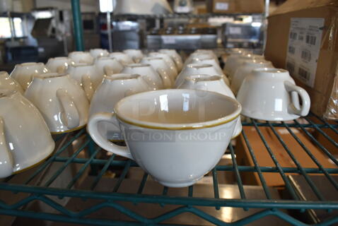 27 White Ceramic Mugs. 4x3x2.5. 27 Times Your Bid!