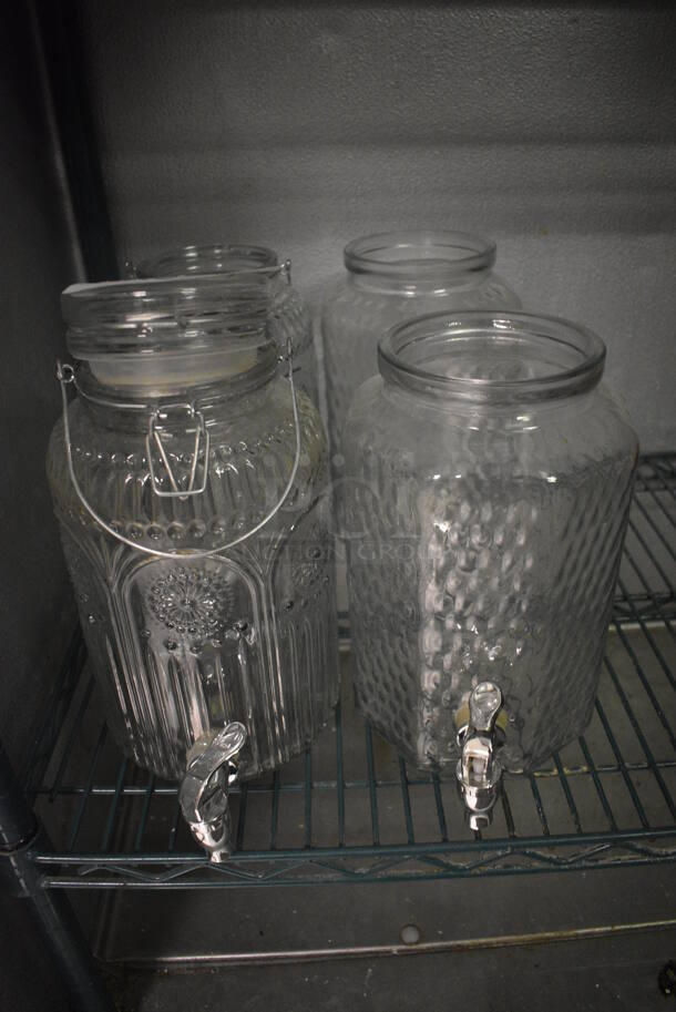 4 Various Glass Beverage Jar Dispensers. Missing 3 Lids. Includes 6x9x10. 4 Times Your Bid! (kitchen) - Image 1 of 3