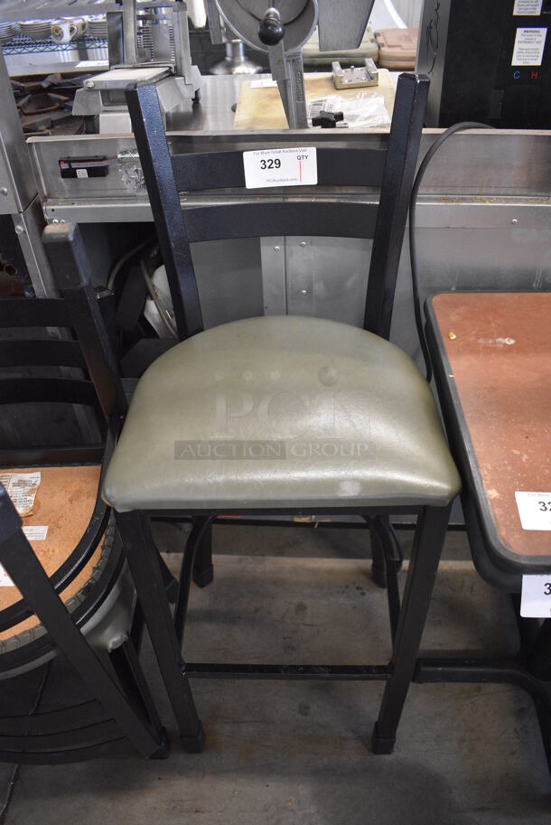 Black Metal Bar Height Chair w/ Green Seat Cushion. 17x16x43