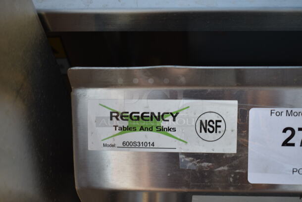 BRAND NEW SCRATCH AND DENT! Regency 600S31014 39" 16-Gauge Stainless Steel Three Compartment Commercial Sink with Galvanized Steel Legs and without Drainboards - 10" x 14" x 12" Bowls. Missing 1 Leg.  - Image 9 of 9