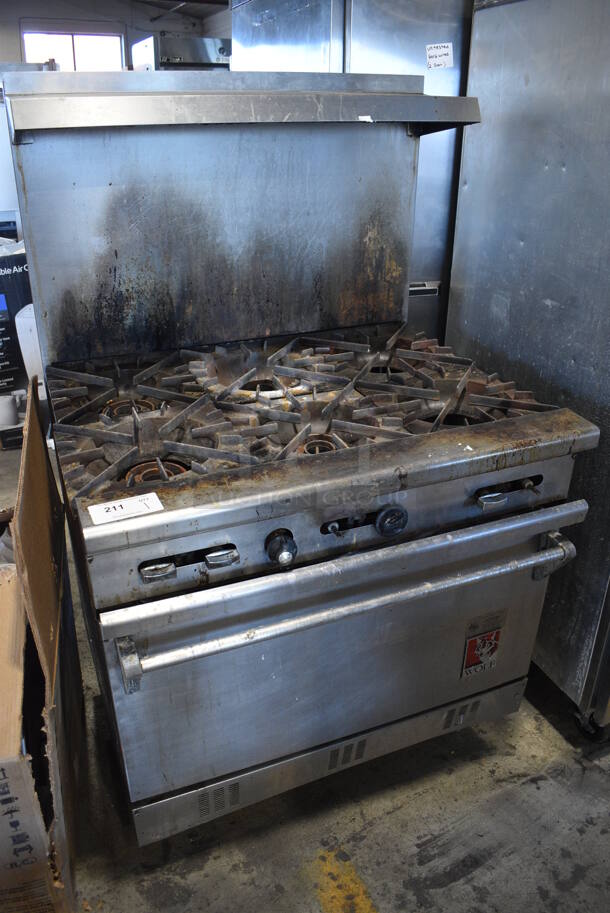Wolf Stainless Steel Commercial Natural Gas Powered 6 Burner Range w/ Oven, Over Shelf and Back Splash. 36x31x60 - Image 2 of 6