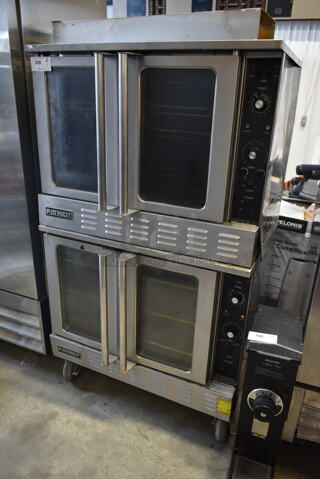 2 Patriot PT-COE Stainless Steel Commercial Electric Powered Full Size Convection Ovens w/ View Through Doors, Metal Oven Racks and Thermostatic Controls on Commercial Casters. 208 Volts, 3 Phase. 2 Times Your Bid!