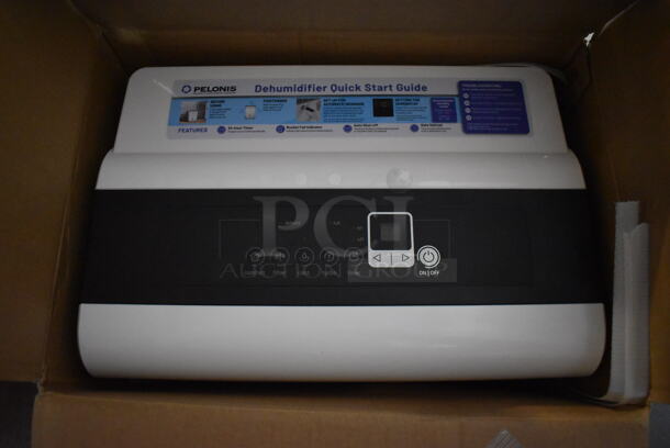 IN ORIGINAL BOX! Pelonis PAD20C1AWT ENERGY STAR 22 Pint Dehumidifier. 120 Volts, 1 Phase. 15x10.5x19