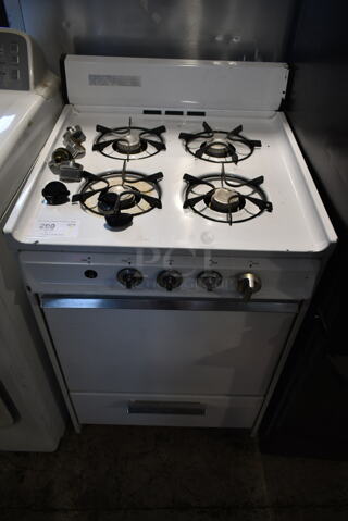 Metal Gas Powered 4 Burner Range w/ Oven.