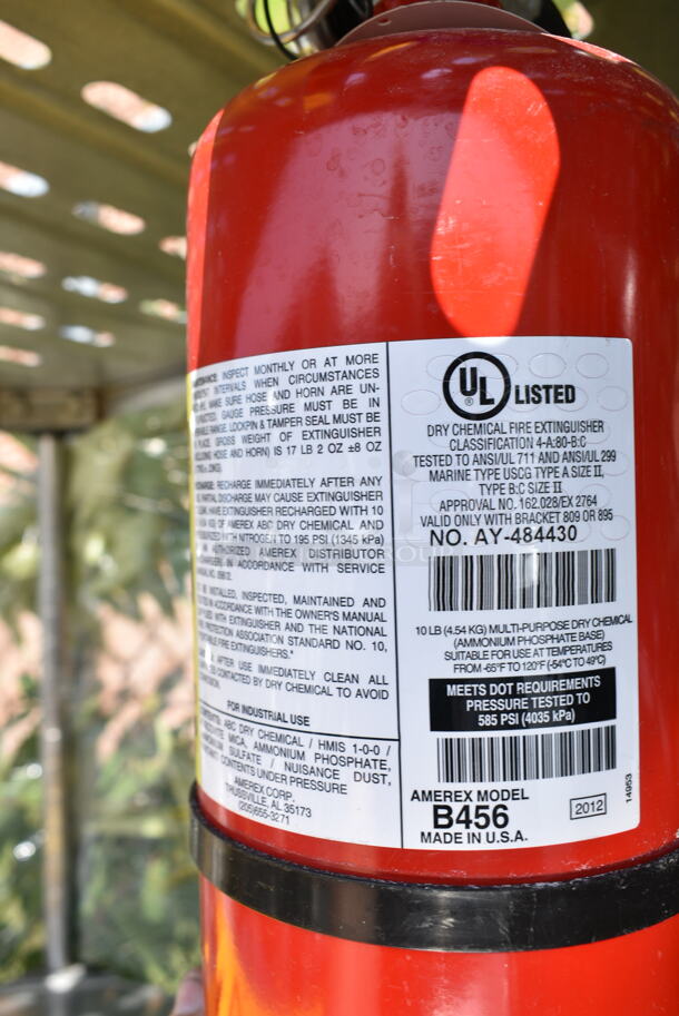 Chrome Finish 4 Tier Shelving Unit w/ Contents Including Fire Extinguisher, Wet Floor Caution Sign, Salad Spinner. BUYER MUST DISMANTLE. PCI CANNOT DISMANTLE FOR SHIPPING. PLEASE CONSIDER FREIGHT CHARGES. We Will Not Ship The Fire Extinguisher.  - Image 8 of 12