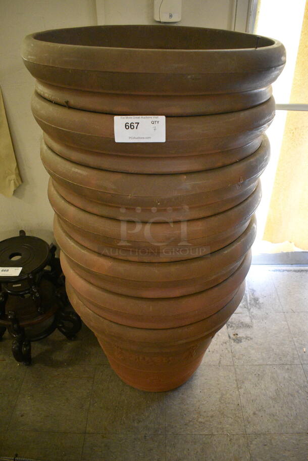 7 Large Composite Planters. 7 Times Your Bid! - Image 1 of 2