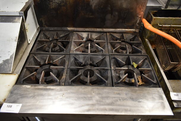 Bakers Pride Stainless Steel Commercial Natural Gas Powered 6 Burner Range w/ Oven and Back Splash on Commercial Casters. - Image 2 of 7
