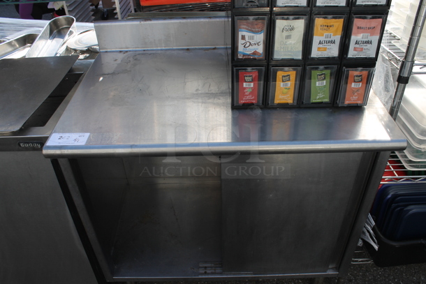 Stainless Steel Commercial Table w/ Back Splash and Under Shelf. - Image 1 of 5
