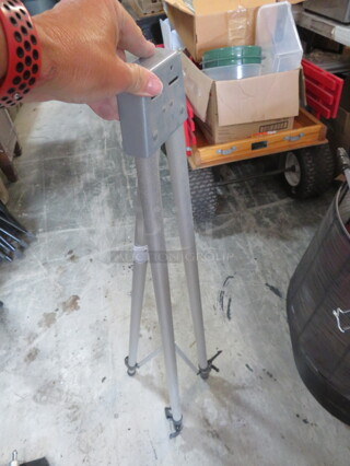 One Tripod Stand.