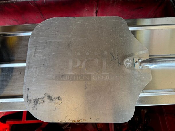 Aluminum Pizza peel with 22" Wooden Handle

 - Image 2 of 3