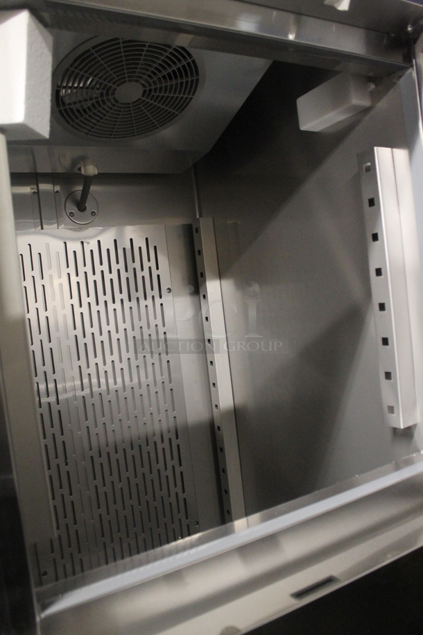 BRAND NEW! 2022 Avantco 178SS1F2HC Stainless Steel Commercial 2 Half Door Reach In Freezer w/ Poly Coated Racks. 115 Volts, 1 Phase. Stock Picture Used For Gallery Picture. Tested and Working! - Image 6 of 10