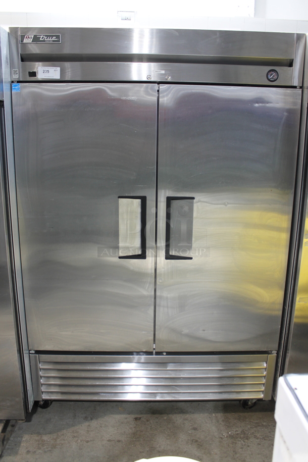 True Stainless Steel Commercial 2 Door Reach In Freezer w/ Poly Coated Racks on Commercial Casters. 115 Volts, 1 Phase. - Item #1099725