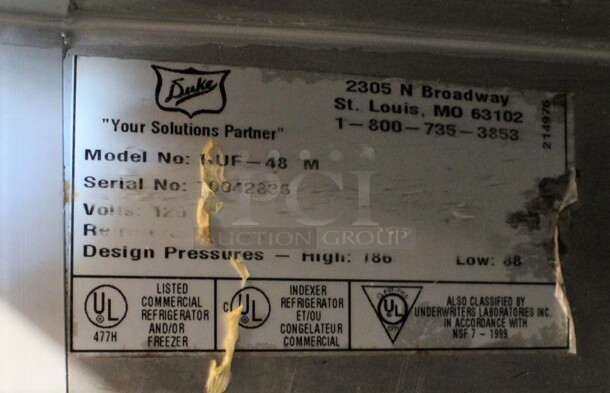Duke Model RUF-48M Stainless Steel Commercial 2 Door Work Top Cooler w/ Poly Coated Racks and Wood Pattern Doors. 120 Volts, 1 Phase. 48x30x40. Tested and Working! - Image 6 of 7