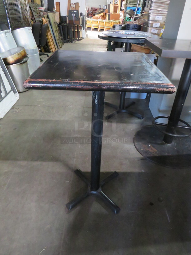Wooden Black Table Top On A Bar Height Base. 24X24X42