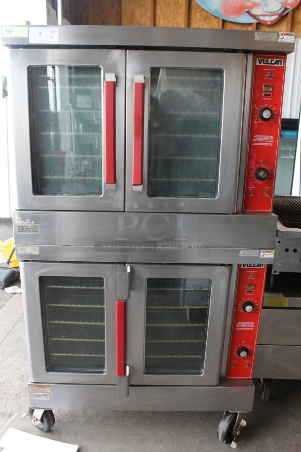 2 Vulcan VC4GD-64 Stainless Steel Commercial Natural Gas Powered Full Size Convection Ovens w/ View Through Doors, Metal Oven Racks and Thermostatic Controls on Commercial Casters. 2 Times Your Bid!