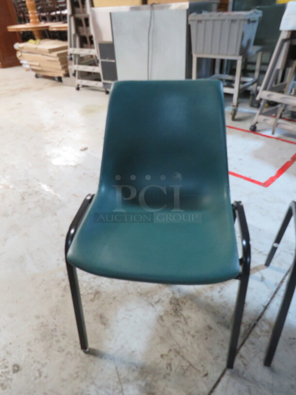 Chrome Stack Chair With Green Molded Seat/Back. 3XBID