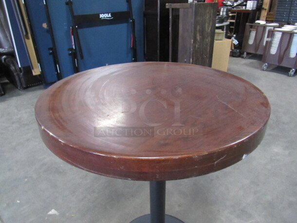 One Round Bar Height Wooden Table With A Heavy Laquered Top On A Pedestal Base. 30X30X41 - Image 2 of 2