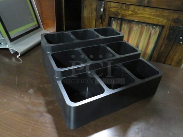One 14X14X5.5 Poly 9 Compartment Organizer.