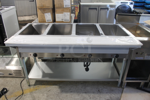 BRAND NEW SCRATCH AND DENT! 2022 KoolMore KM-CWS Stainless Steel Commercial Electric Powered 4 Bay Steam Table w/ Cutting Board and Under Shelf. 120 Volts, 1 Phase. Tested and Working!