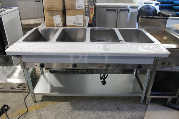 BRAND NEW SCRATCH AND DENT! 2022 KoolMore KM-CWS Stainless Steel Commercial Electric Powered 4 Bay Steam Table w/ Cutting Board and Under Shelf. 120 Volts, 1 Phase. Tested and Working! - Image 1 of 7