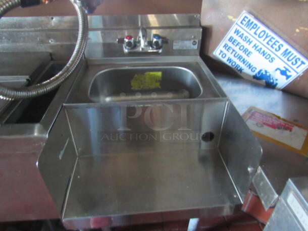 BUYER MUST REMOVE! One Krowne Stainless Steel Sink, Faucet And Blender Shelf. Model# S-18BD. 18X23X32