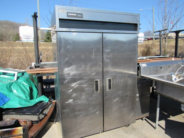 One Stainless Steel Delfield 2 Door Refrigerator On Casters. Model# 6051-S. 115 Volt. 51X33X79