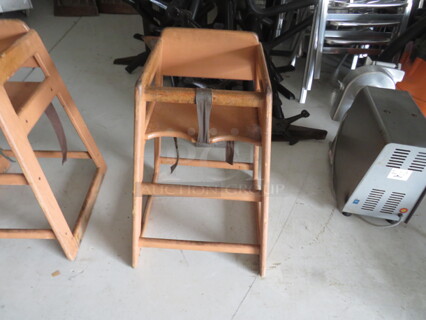 One Wooden High Chair.