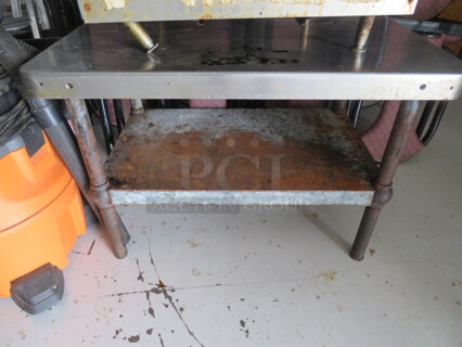 One Stainless Steel Equipment Table With Under Shelf. 36X27X27.5