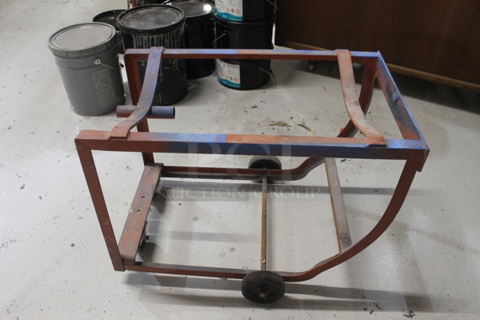 Red Metal Barrel Cradle Dolly on Casters.