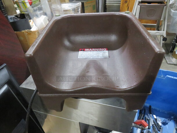One Cambro Dual Sided Booster Seat.