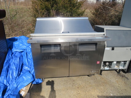 One True 2 Door Prep Table With 2 Racks, On Casters. Model# TSSU-48-18M-B. 115 Volt. 48X34X46