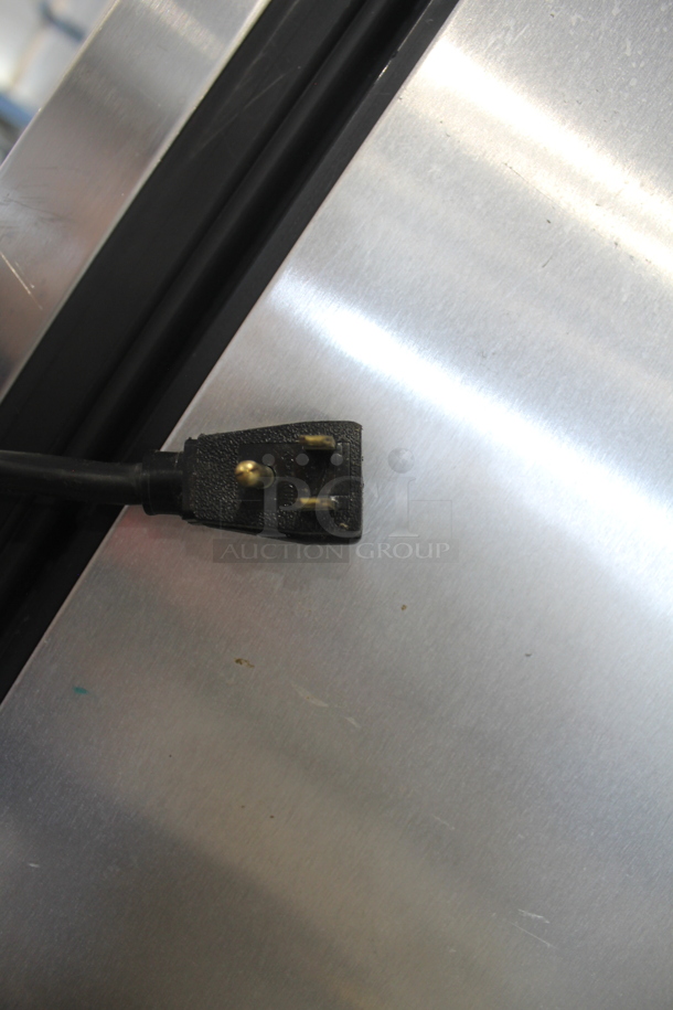 2015 True TG1R-1S ENERGY STAR Stainless Steel Commercial Single Door Reach In Cooler w/ Poly Coated Racks on Commercial Casters. 115 Volts, 1 Phase. Tested and Working! - Image 10 of 10