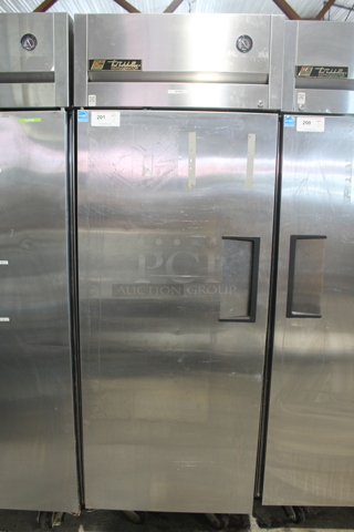 2015 True TG1R-1S ENERGY STAR Stainless Steel Commercial Single Door Reach In Cooler w/ Poly Coated Racks on Commercial Casters. 115 Volts, 1 Phase. Tested and Working!