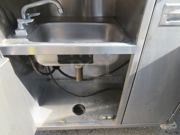 One STainless Steel Kiosk With 1 Door Cooler, Hand Sink, Cash Drawer, Work Area, SS Flip Up Side Table, 240 Volt Breaker Box, Ariston Hot Water Heater, 4 Doors For Storage, On Casters. 85X35X61 - Image 2 of 6