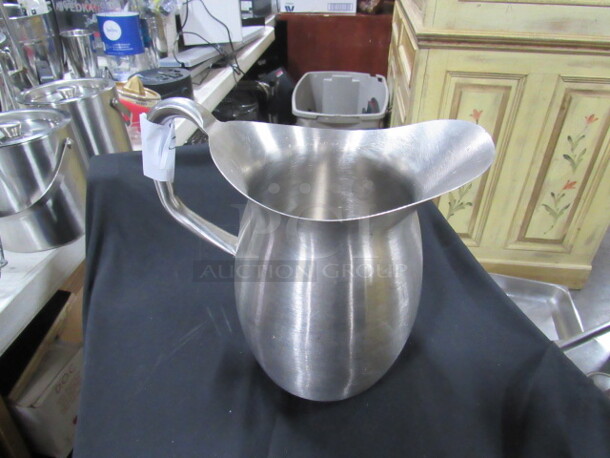 One Vollrath Stainless Steel Bell Pitcher.